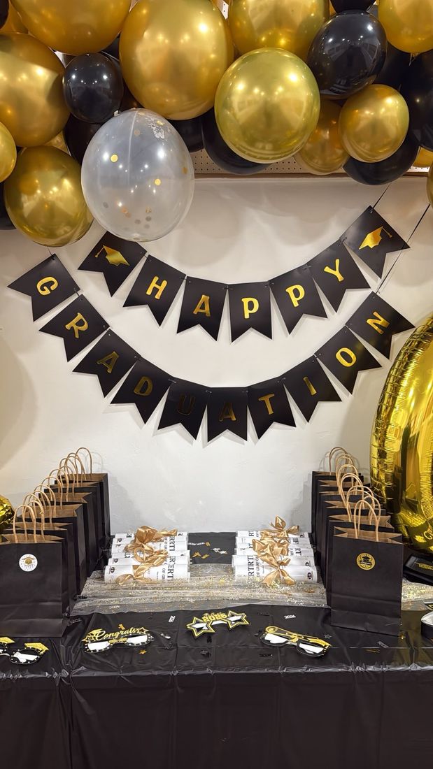 Our Happy Graduation balloon arch and celebration setup